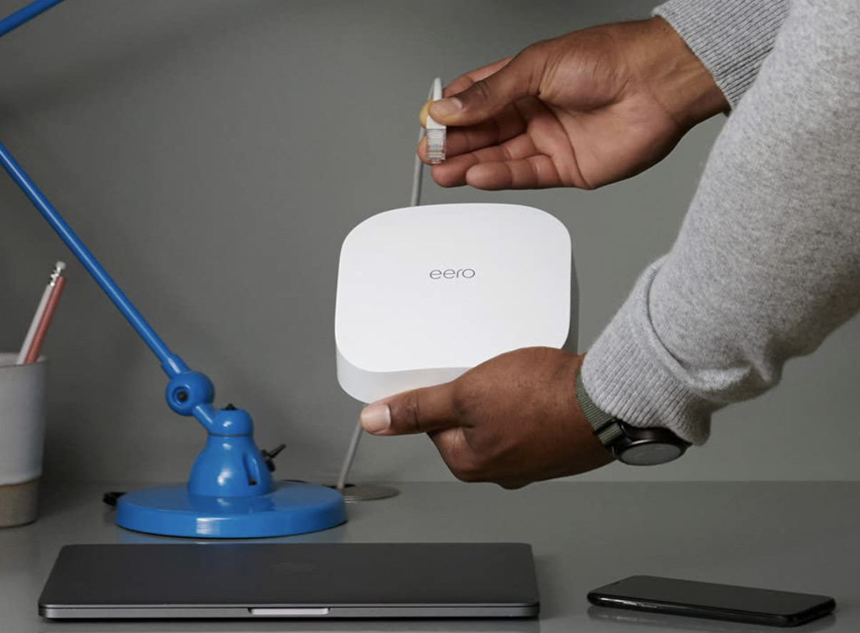 Person installing Eero Pro router