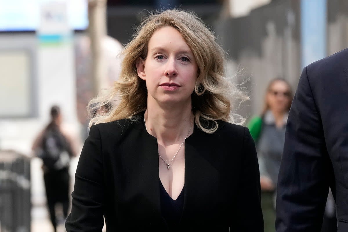 Former Theranos CEO Elizabeth Holmes leaves federal court in San Jose, California, on 17 March. (Associated Press)