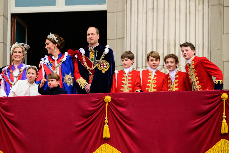 The young royal children of Prince William and Kate Middleton join Queen Camilla and King Charles on the balcony. (Photo: Leon Neal/Getty Images)