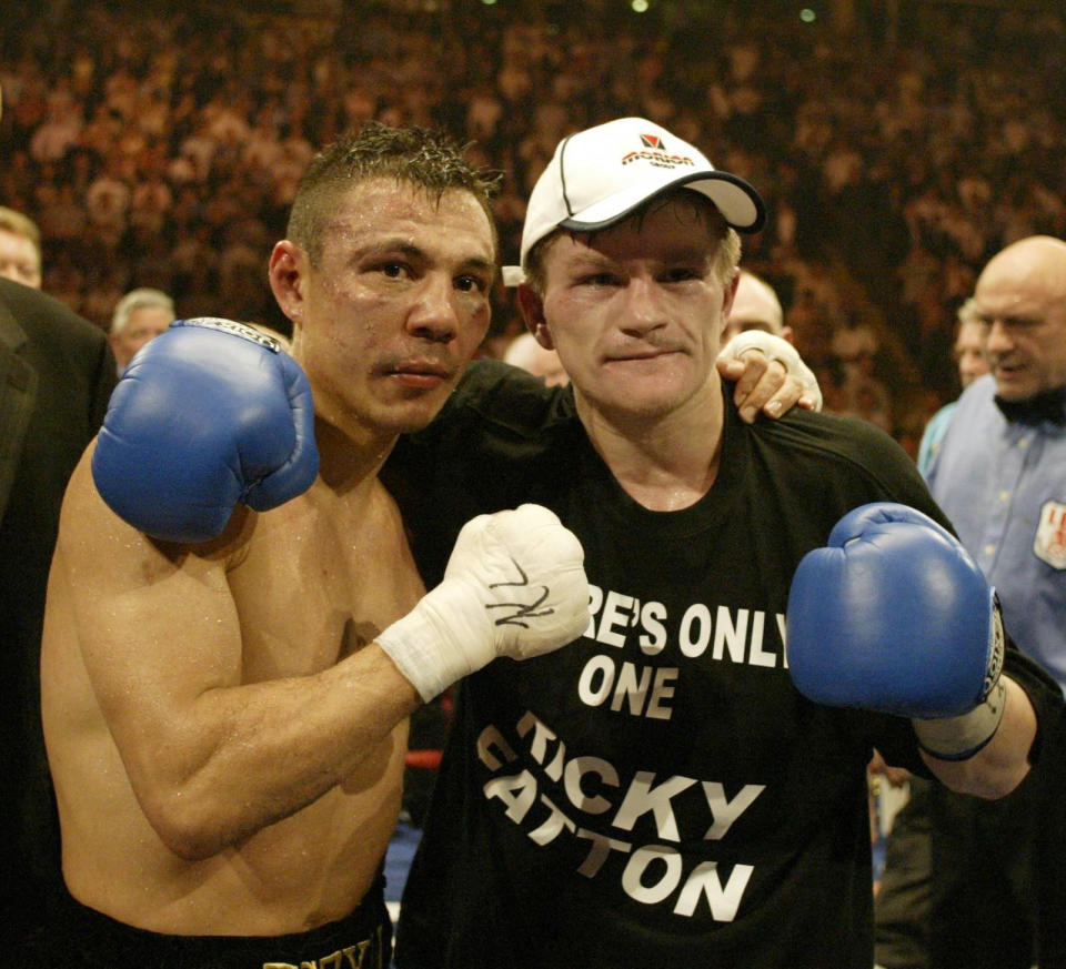 Ricky Hatton poses with Kostya Tszyu after the IBF light-welterweight match.