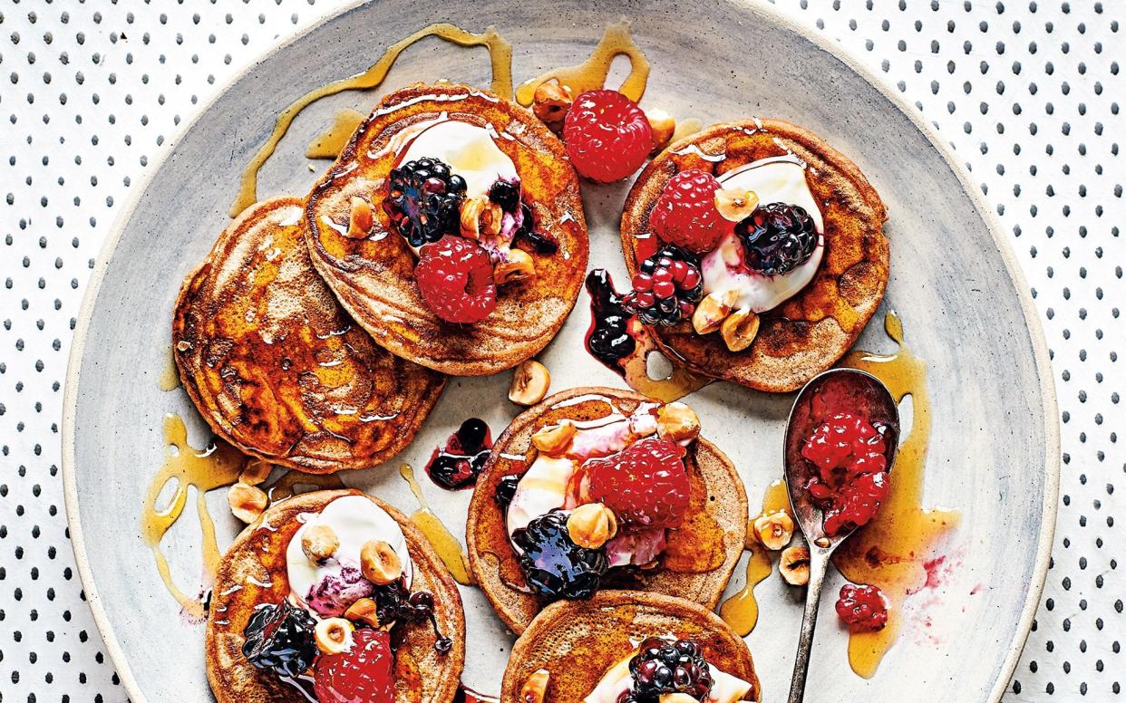 Teff flour and rice flour go into the batter for these breakfast essentials, finished with fresh berries -