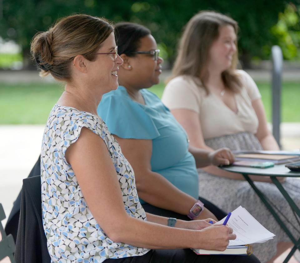 Amy Rohling McGee, president of the Health Policy Institute of Ohio, leads a team meeting of her staff at the Columbus Commons Downtown.  She said the research is clear that racism is an ongoing crisis resulting in inequities and disparities that have led to serious consequences for the health and well-being of Ohioans of color.