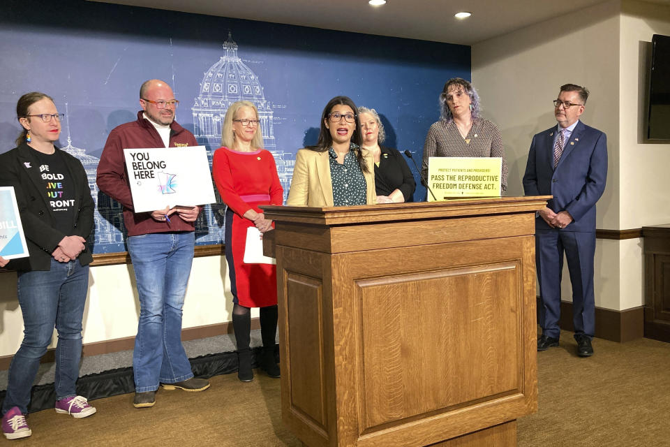 State Sen. Erin Maye Quade, D-Apple Valley, speaks at a news conference, Friday, April 21, 2023, at the State Capitol in St. Paul, Minn., in support of her bill to make Minnesota a refuge for youth and families from other states who travel to Minnesota for gender-affirming care. (AP Photo/Steve Karnowski)