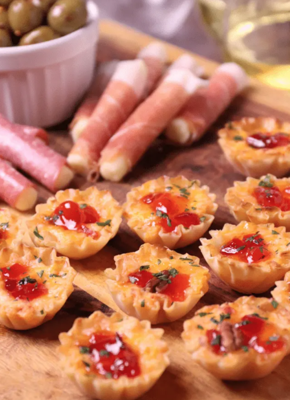 <p>A Southern Soul</p><p>Crispy phyllo cups filled with pimento cheese then topped with sweet, slightly spicy red pepper jelly makes for a delicious appetizer for the holidays, game day or whenever you’re entertaining.</p><p><strong>Get the recipe: <a href="https://www.asouthernsoul.com/pimento-cheese-bites/" rel="nofollow noopener" target="_blank" data-ylk="slk:Pimiento Cheese Bites;elm:context_link;itc:0;sec:content-canvas" class="link "><em>Pimiento Cheese Bites</em></a></strong></p>