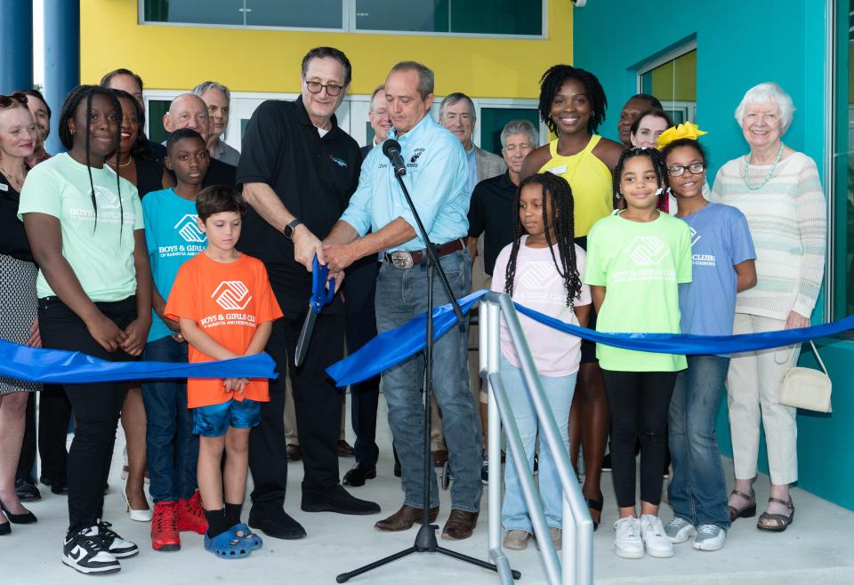 Guests and youth enjoy the grand opening of the new Louis and Gloria Flanzer Boys & Girls Club campus. This new state-of-the-art addition is part of an expansion of programs and spaces for youth and families in DeSoto County.