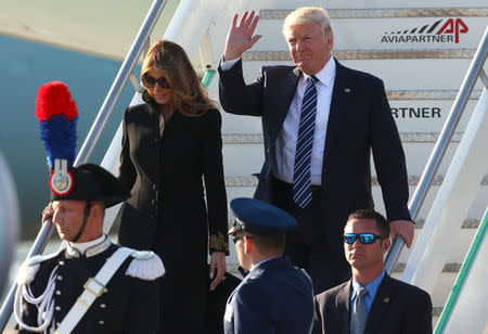 U.S. President Donald Trump and first lady Melania Trump arrive at the Leonardo da Vinci-Fiumicino Airport in Rome, Italy, May 23, 2017. REUTERS/Alessandro Bianchi
