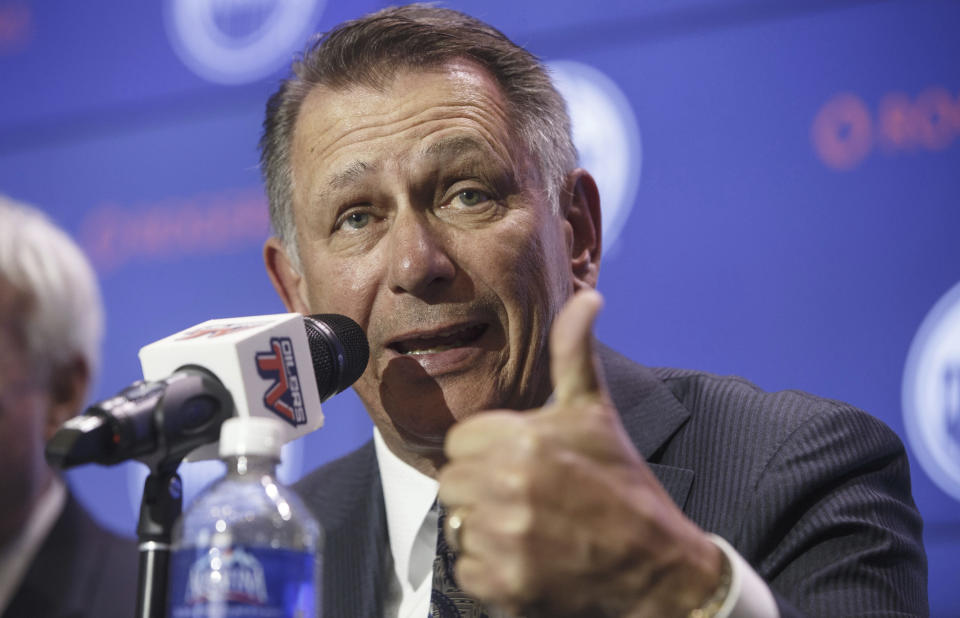 Newly named Edmonton Oilers general manager Ken Holland speaks during a news conference in Edmonton, Alberta, May 7, 2019. Holland and Dallas Stars GM Jim Nill were teammates in junior hockey nearly a half-century ago with big aspirations as players. Their names are together on the Stanley Cup four times, not as players but rather for their front-office roles with the Red Wings during Detroit's run of championships from 1997-2008. Now they are general managers of opposing teams in the Western Conference Finas, old friends both hoping to get to another Stanley Cup. (Jason Franson/The Canadian Press via AP)