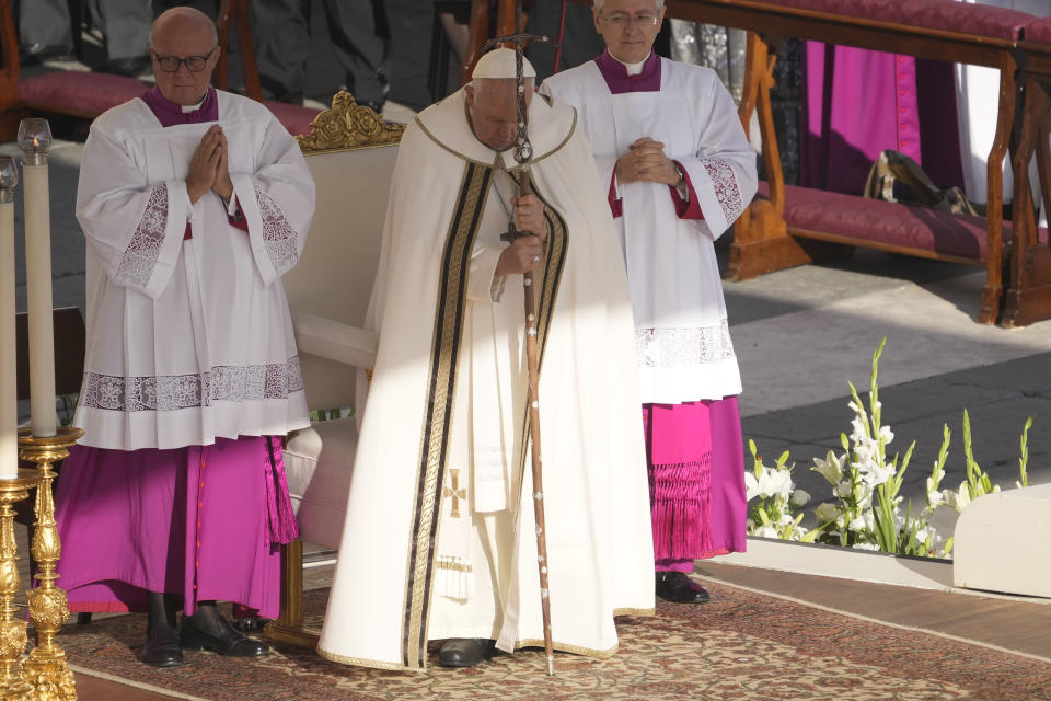 Pope Francis presides over a mass concelebrated by the new cardinals for the start of the XVI General Assembly of the Synod of Bishops in St. Peter's Square at The Vatican, Wednesday, Oct.4, 2023. Pope Francis is convening a global gathering of bishops and laypeople to discuss the future of the Catholic Church, including some hot-button issues that have previously been considered off the table for discussion. Key agenda items include women's role in the church, welcoming LGBTQ+ Catholics, and how bishops exercise authority. For the first time, women and laypeople can vote on specific proposals alongside bishops (AP Photo/Andrew Medichini)