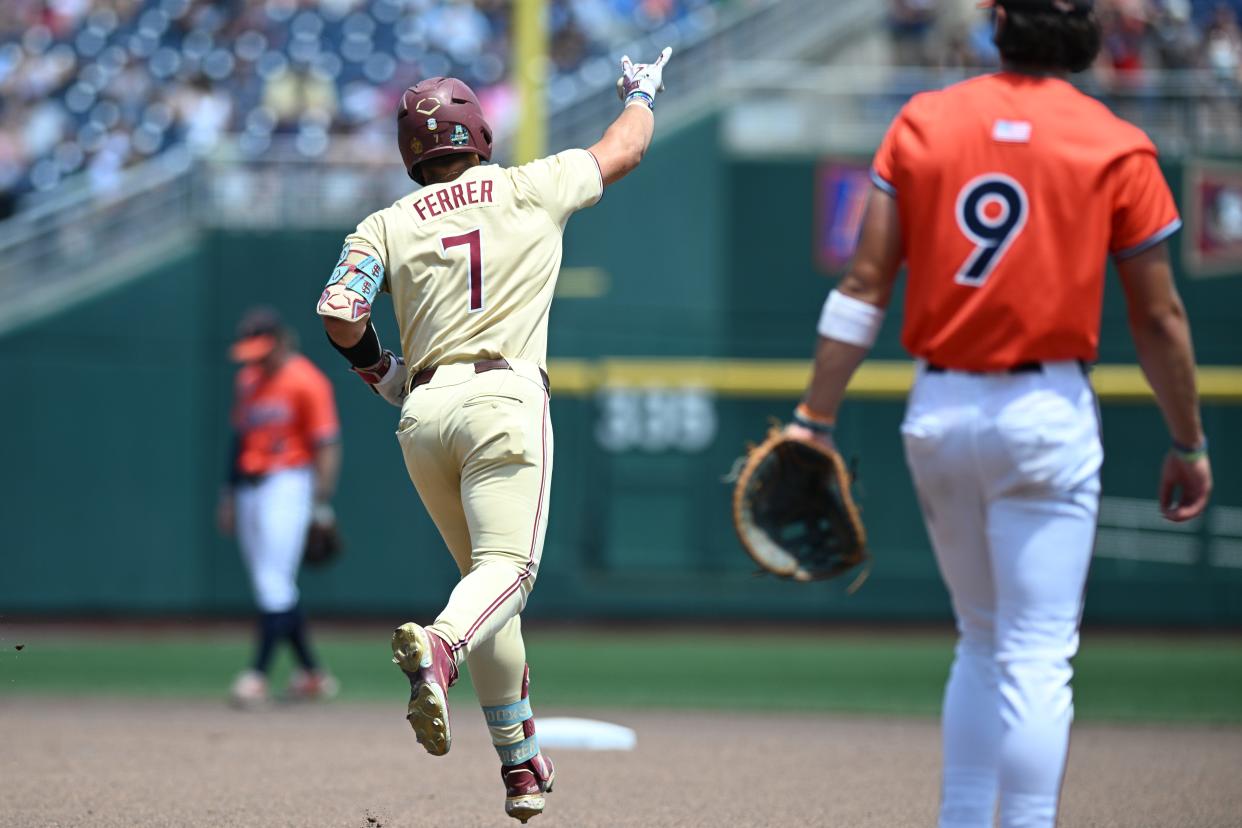 Jun 16, 2024; Omaha, NE, USA; Florida State Seminoles left fielder Jaime Ferrer (7) reacts after hitting a home run against the Virginia Cavaliers during the fourth inning at Charles Schwab Field Omaha.