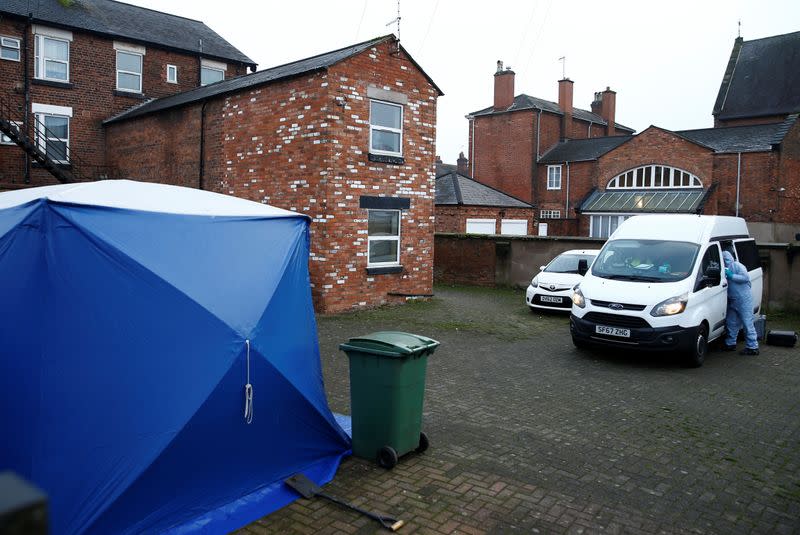 A forensic tent and police vehicles stand outside a property, which is being searched in connection with yesterday's stabbing on London Bridge, in which two people were killed, in Stafford