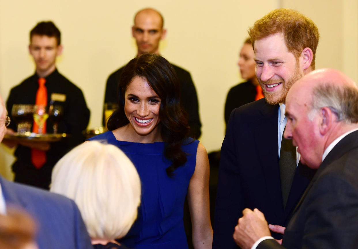 The Duke and Duchess of Sussex meet guests during the interval at the ‘100 Days to Peace’. (PA)