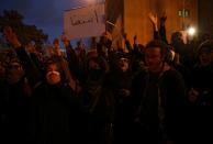 FILE PHOTO: Iranian people gather to show their sympathy to the victims of the crash of the Boeing 737-800 plane, flight PS 752, in Tehran