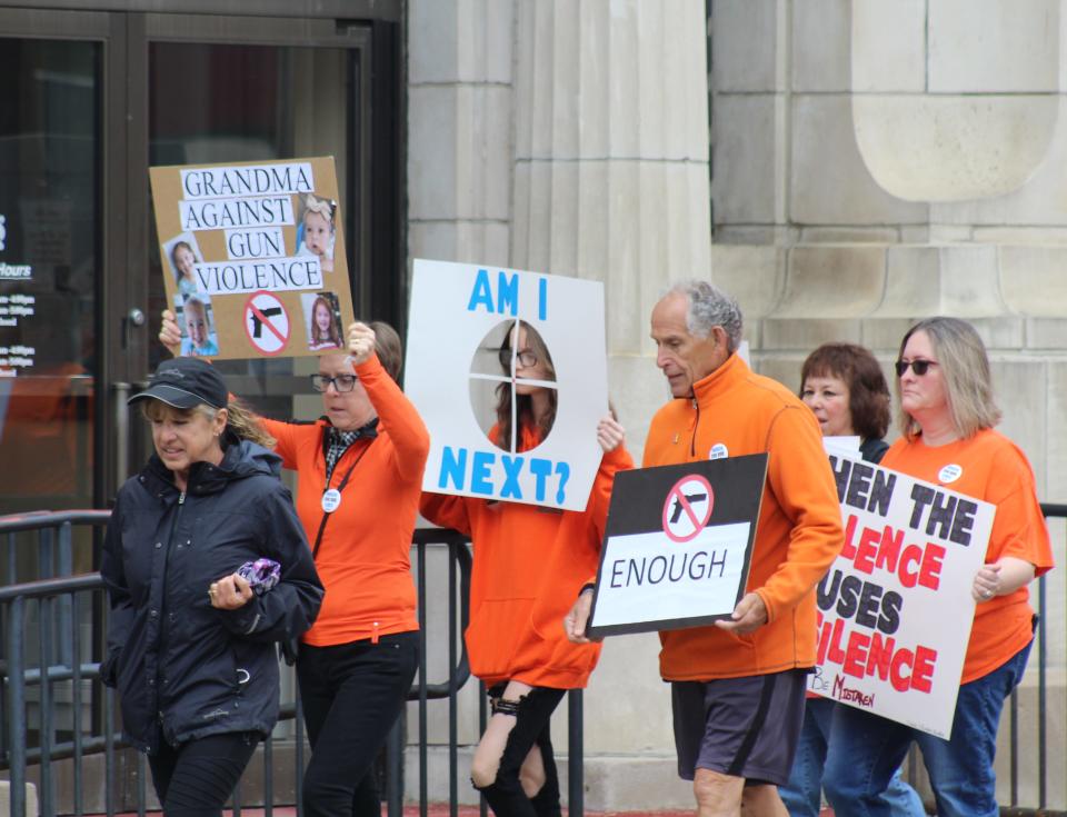 Participants in the March for Our Lives Walk and Rally travel Main Street in the Village of Wellsville Saturday. Similar events were held across the country to push for gun control legislation in the wake of a mass shooting in Uvalde, Texas that killed 21 people, including 19 children.