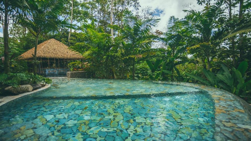 Guests can enjoy one of six hot spring pools to relax in during the day or at night. - Credit: Brice Ferre