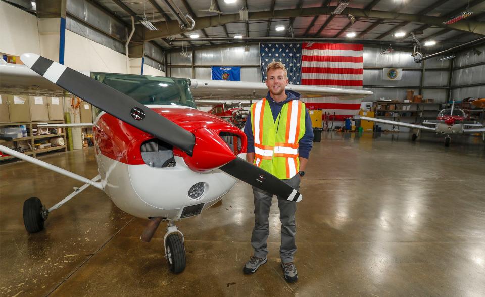 Manitowoc County Airport Manager Bryan Linger poses in hanger at the airport, Tuesday, October 11, 2022, in Manitowoc, Wis.