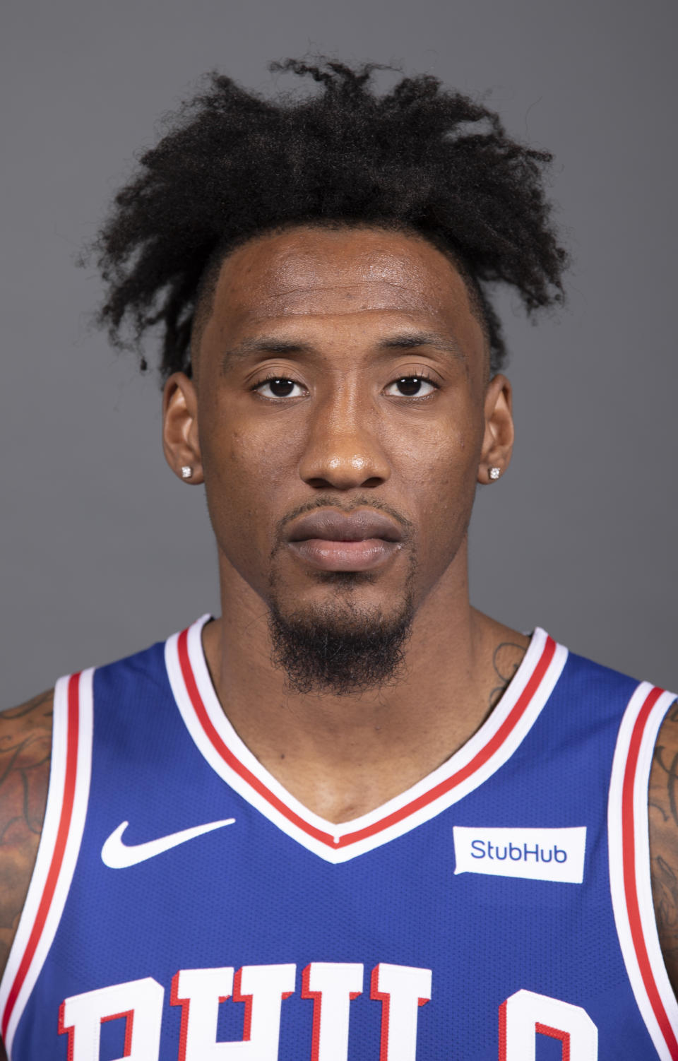 File-This Set. 21, 2018, file photo shows Philadelphia 76ers' Robert Covington posing for a photograph during media day at the NBA basketball team's practice facility, in Camden, N.J. Jimmy Butler is headed to Philadelphia, ending the weeks-long saga of him wanting out of Minnesota. A person with knowledge of the situation says Butler is being traded to the 76ers in a package that will send Dario Saric and Covington to the Timberwolves. (AP Photo/Chris Szagola, File)