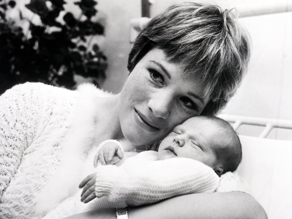 Julie Andrews proudly presents her "Fair Lady," her one-day-old baby, at the London Clinic November 27th