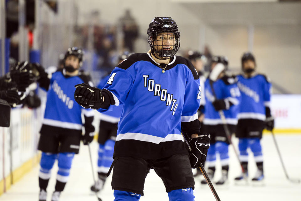 Toronto forward Natalie Spooner (24) celebrates with teammates after scoring against Minnesota during the first period of a PWHL hockey game in Toronto, Ontario, Saturday, Feb. 3, 2024. (Christopher Katsarov/The Canadian Press via AP)