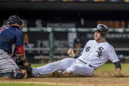 Aug 31, 2018; Chicago, IL, USA; Chicago White Sox catcher Kevan Smith (36) gets tagged out at home plate by Boston Red Sox catcher Sandy Leon (3) during the sixth inning at Guaranteed Rate Field. Mandatory Credit: Patrick Gorski-USA TODAY Sports