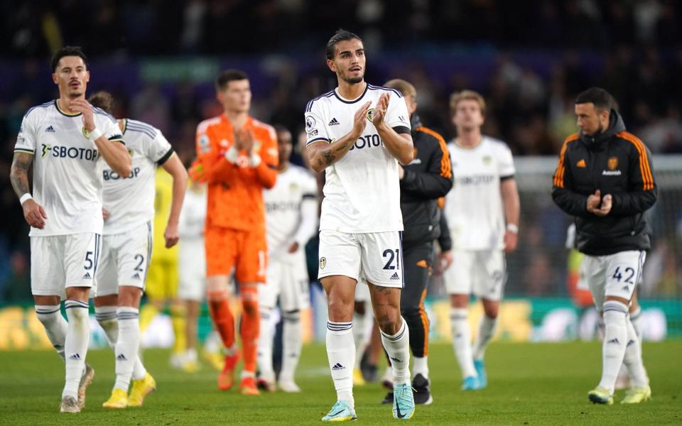 Leeds players at full time - PA