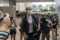 Former lawmaker Cyd Ho arrives at the West Kowloon Magistrates's Courts in Hong Kong, Friday Nov. 25, 2022. Hong Kong Cardinal Joseph Zen and five others were in court on Friday over charges of failing to register a now-defunct fund that aimed at helping people arrested in the widespread protests three years ago. (AP Photo/Anthony Kwan)