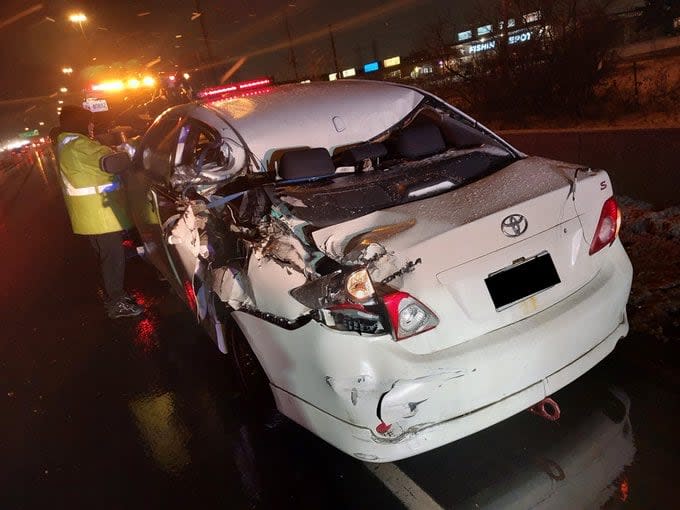 Ontario Provincial Police posted this photo on X, formerly Twitter, of the damaged vehicle. Police said it was involved in an earlier crash east of the Greater Toronto Area, but the driver drove it on Highway 401 anyway. (Submitted by Ontario Provincial Police - image credit)