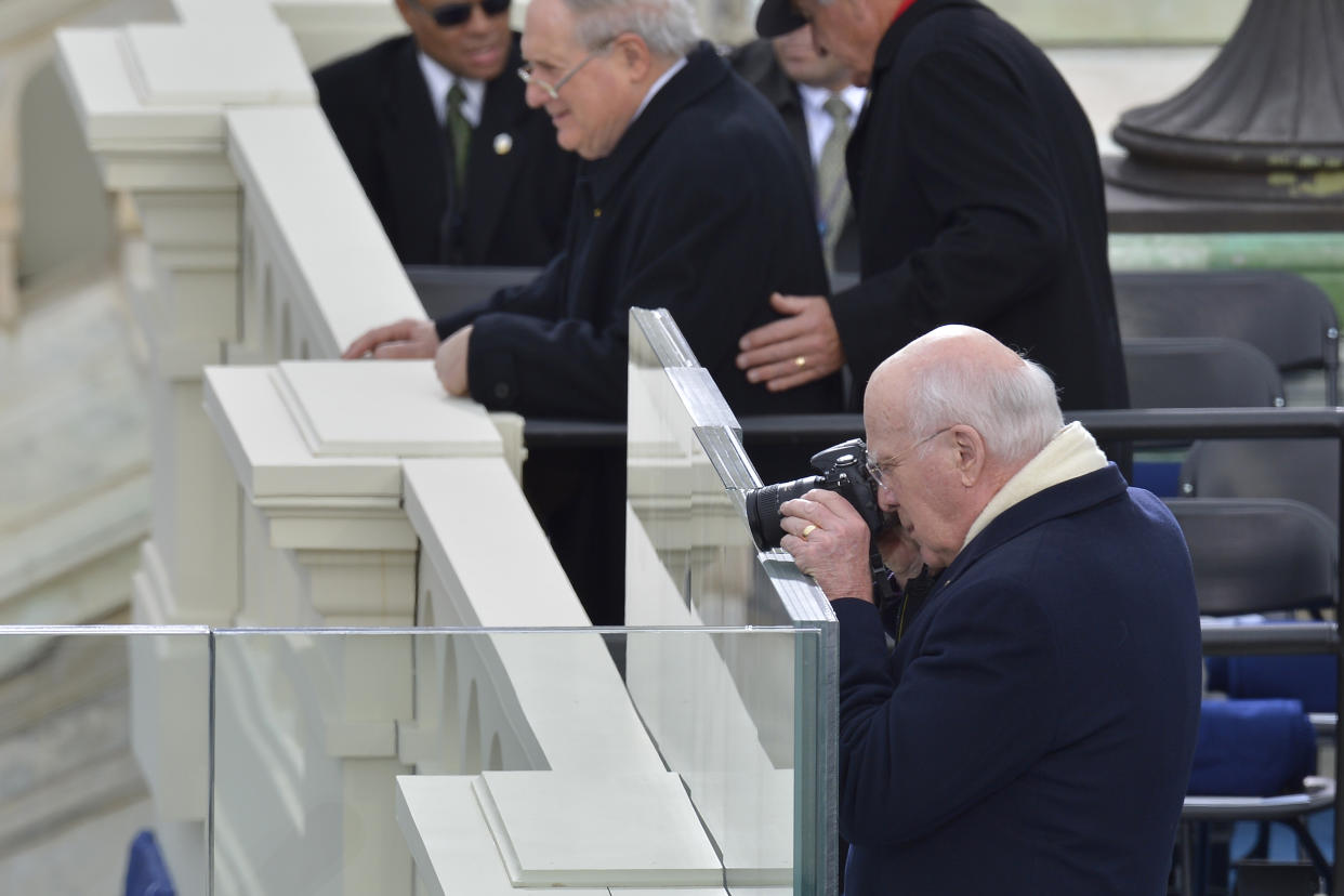 Sen. Patrick Leahy, D-Vt., takes photos on the inaugural stand during Barack Obama's Presidential Inauguration Ceremony at the Capitol (Ricky Carioti / The Washington Post via Getty Images)