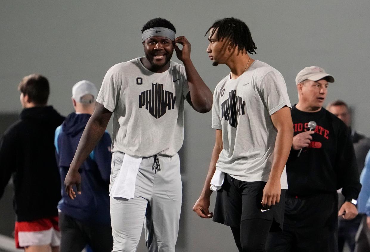 Former Ohio State quarterback Cardale Jones (left), seen here with current Buckeye quarterback C.J. Stroud at OSU's Pro Day in March, has signed with the Edmonton Elks of the Canadian Football League.