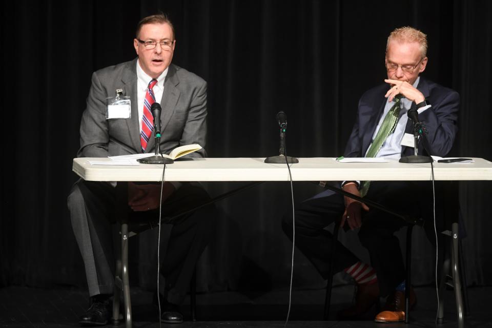 Randall "Randy" Hemann, left, speaks during an Aug. 16 public forum in Oak Ridge High School’s auditorium. Selected as Oak Ridge's new city manager, city council will vote on his contract Monday, Aug. 28. At right is Lane Bailey, senior vice president of GovHR USA, the search firm that council hired to assist them in finding a new city manager to fill the position left open by the May retirement of Mark Watson, who retired after 12 years in the role.