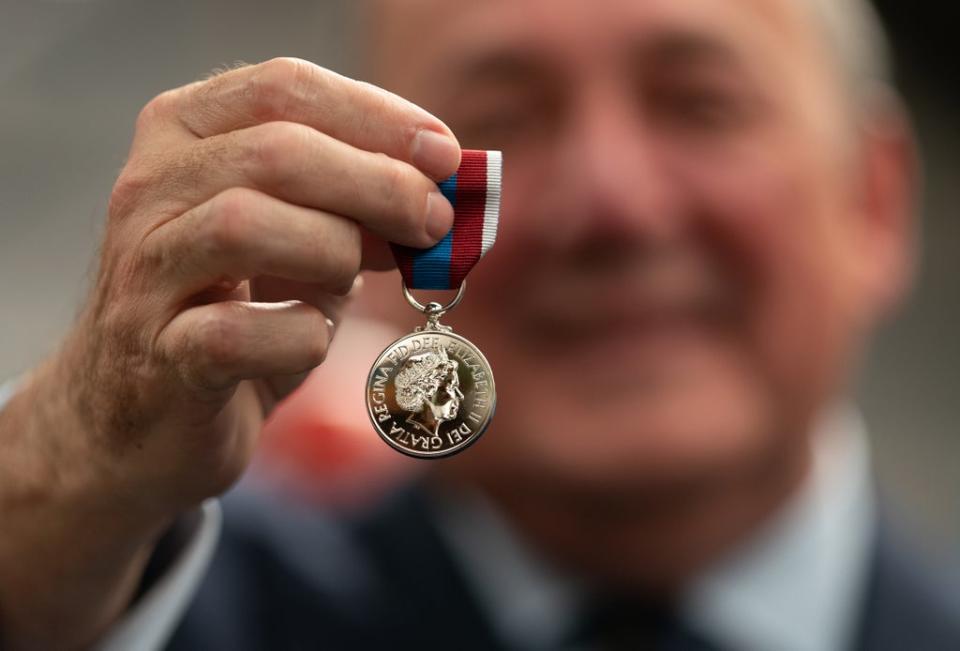 Worcestershire Medal Service chief executive Phil McDermott with the Queen’s Platinum Jubilee Medal. Joe Giddens/PA Wire (PA)