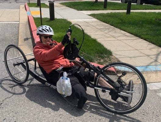 Scott Spitnale on his hand cycle outside the University of Maryland Rehabilitation & Orthopaedic Institute,