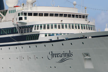 A 440-foot ship owned and operated by the Church of Scientology, SMV Freewinds, is docked under quarantine from a measles outbreak in port near Castries, St. Lucia, May 1, 2019. Picture taken May 1, 2019. REUTERS/Micah George