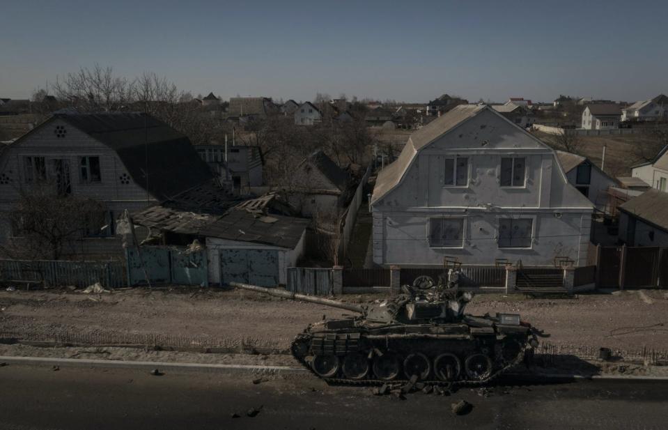 <span class="caption">A destroyed Russian tank sits on a street after battles between Ukrainian and Russian forces on a main road near Brovary, north of Kyiv, on March 10.</span> <span class="attribution"><span class="source">(AP Photo/Felipe Dana)</span></span>