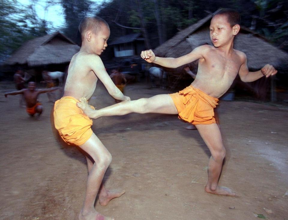 Thai kickboxing, known as Muay Thai, is widespread among children in the country (David Longstreath/AP)