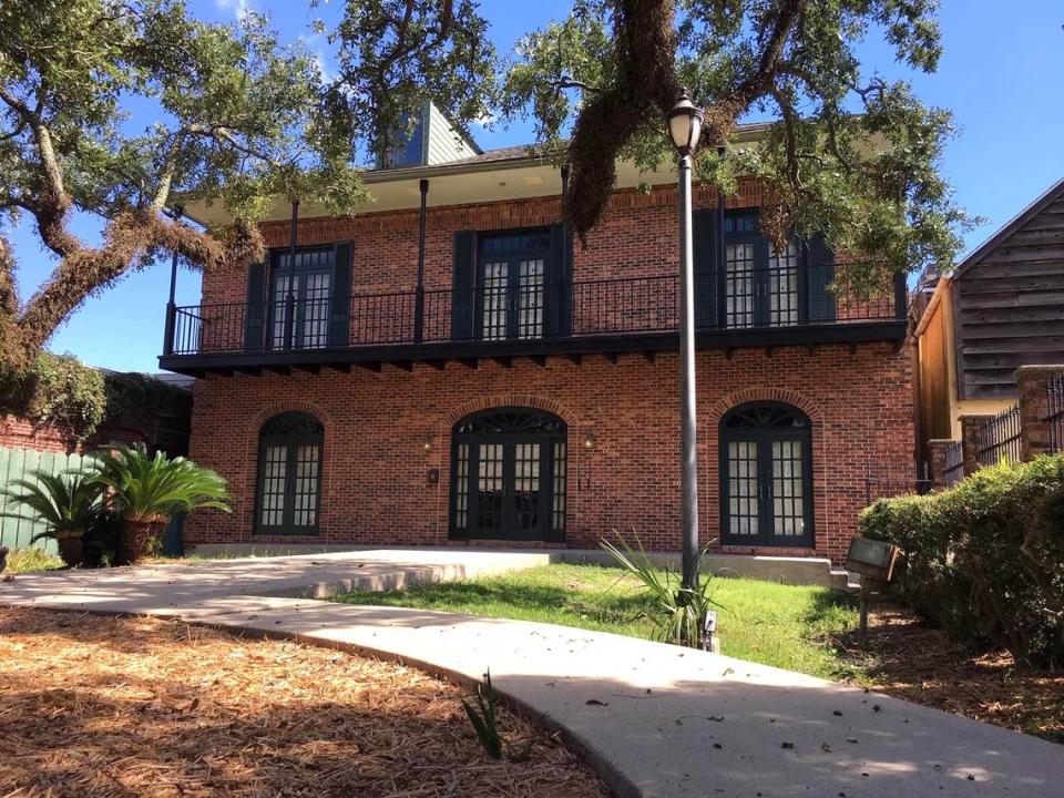 A former law office in downtown Pascagoula now District Flats luxury apartments with the look of New Orleans, a courtyard and modern finishes and amenities.