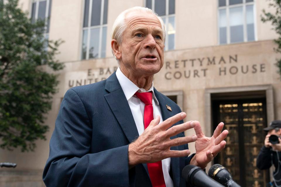 Former Trump White House official Peter Navarro talks to the media as he arrives at U.S. Federal Courthouse in Washington on Jan. 25, 2024.