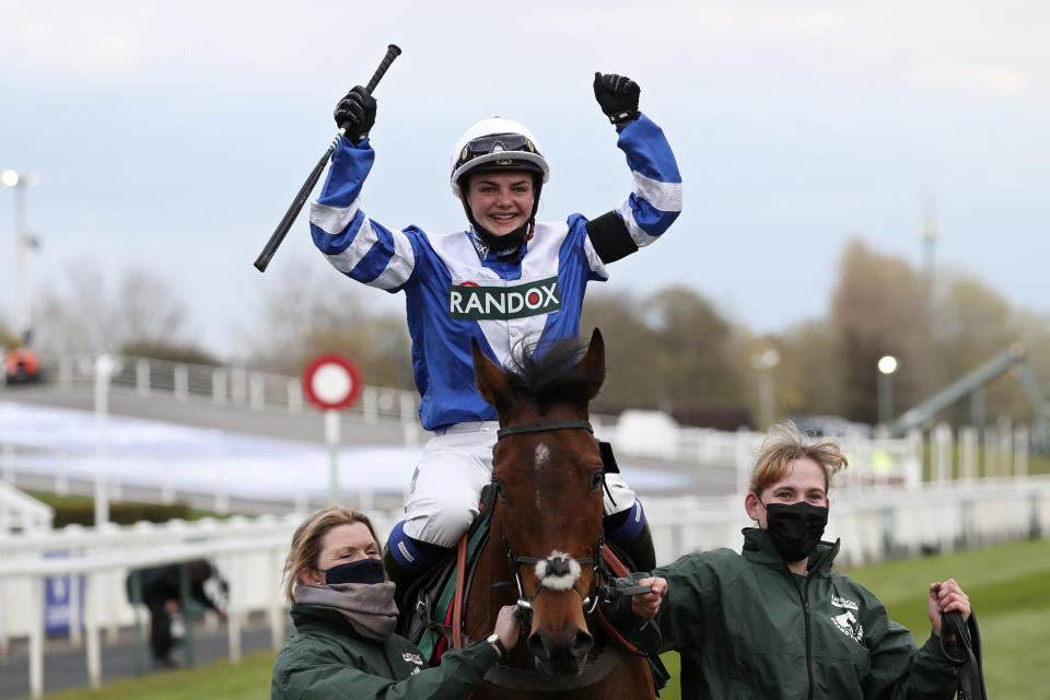 Megan Nicholls riding Knappers Hill celebrates after winning the Weatherbys nhstallions.co.uk Standard Open NH Flat Race on the third day of the Grand National Horse Racing meeting at Aintree racecourse, near Liverpool, England, Saturday April 10, 2021. (AP Photo/Scott Heppell, Pool)