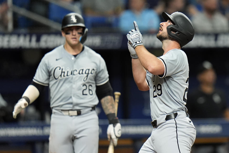 Chicago White Sox's Paul DeJong (29) celebrates his solo home run off Tampa Bay Rays starting pitcher Zach Eflin with Korey Lee (26) during the seventh inning of a baseball game Tuesday, May 7, 2024, in St. Petersburg, Fla. (AP Photo/Chris O'Meara)