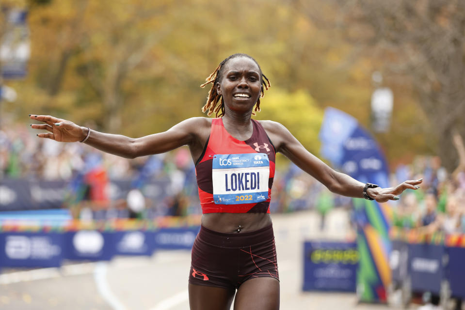 FILE - Sharon Lokedi, of Kenya, crosses the finish line first in the women's division of the New York City Marathon, Sunday, Nov. 6, 2022, in New York. The New York City Marathon women’s record, which has stood for 20 years, could go down Sunday, Nov. 5, 2023 with one of the strongest fields assembled in the history of the race. (AP Photo/Jason DeCrow, File)