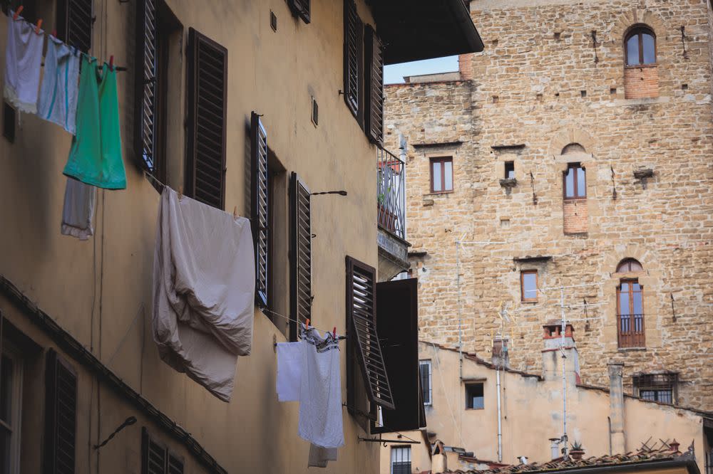 Laundry drying in Windows in Florence Italy