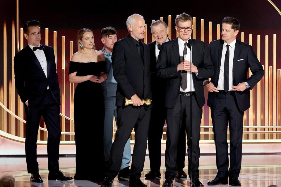 Colin Farrell, Kerry Condon, Barry Keoghan, Martin McDonagh, Brendan Gleeson, Graham Broadbent and Peter O'Brien accept the Best Motion Picture - Musical or Comedy award for "The Banshees of Inisherin" onstage at the 80th Annual Golden Globe Awards held at the Beverly Hilton Hotel on January 10, 2023 in Beverly Hills, California.