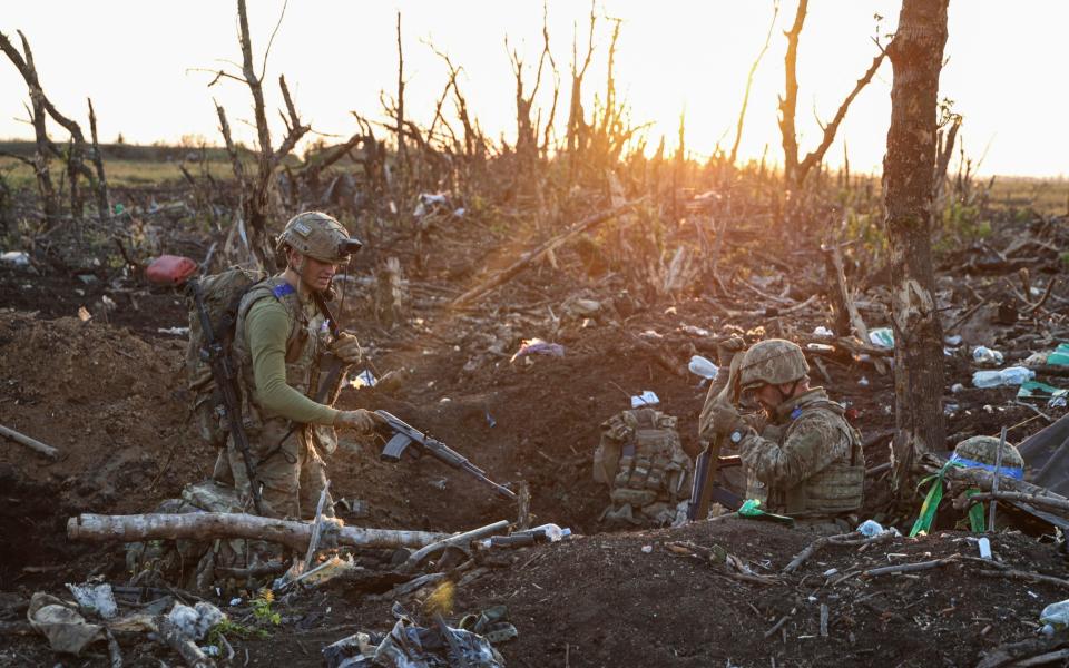 Servicemen on the front line close to Andriivka, in the Donetsk region, on Sunday