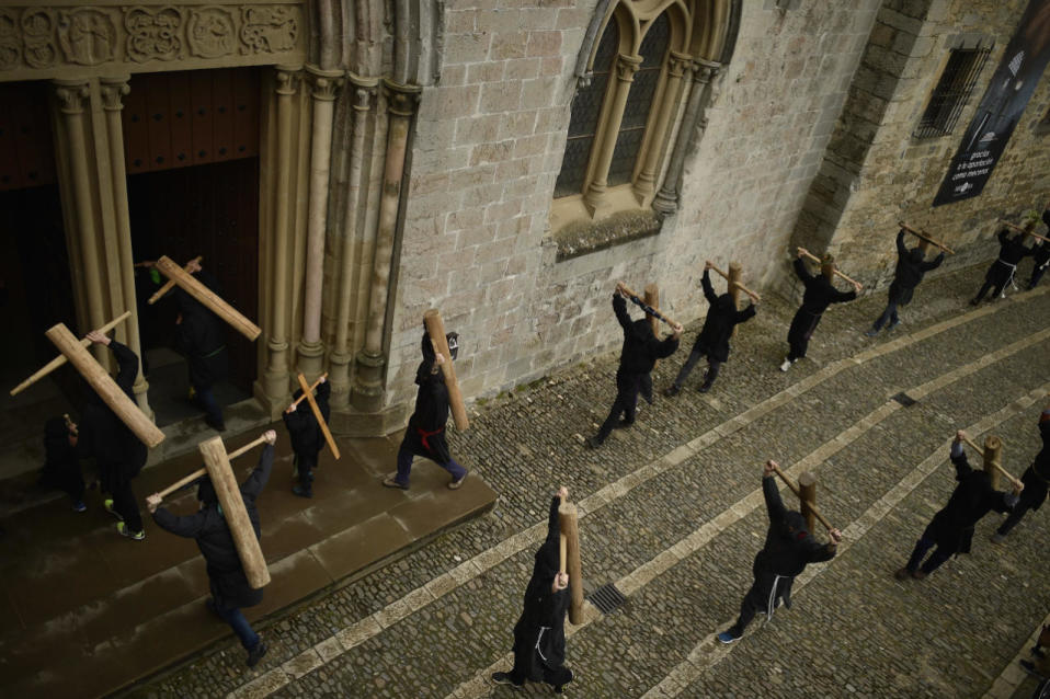 Masked penitents hold their crosses as they arrive at Roncesvalles Church during spring “Romeria Cruceros de Arce”, in northern Spain, May 8, 2016. Every year on the second Sunday in spring, people with crosses march from their small Pyrenees towns to Roncesvalles Church in tribute of the Virgin. (Alvaro Barrientos/AP)