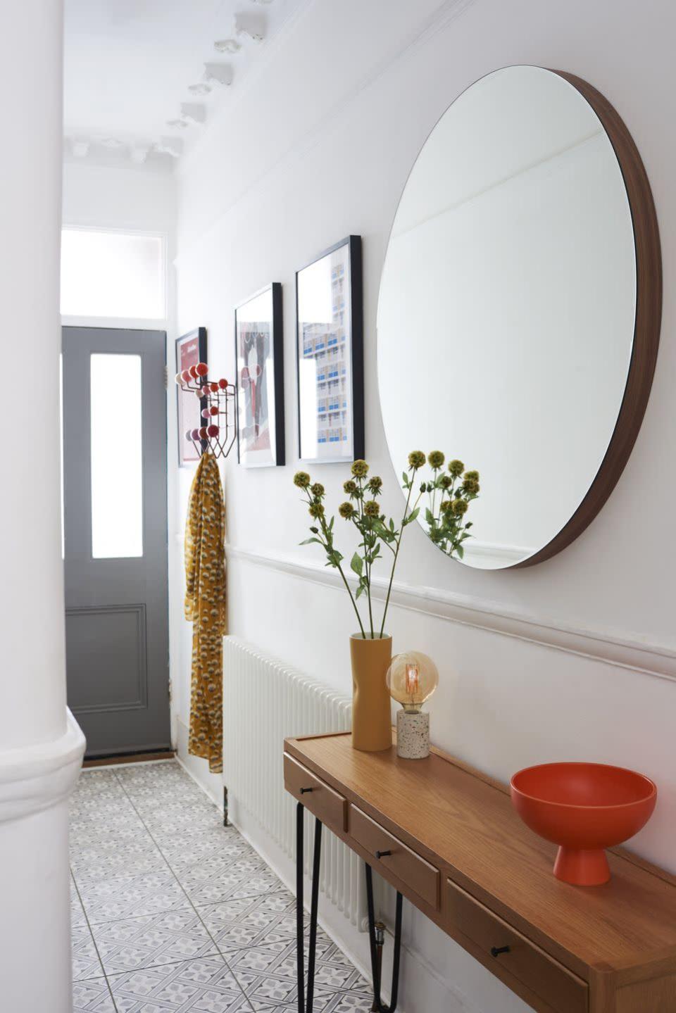 <p>'Create the illusion of space by adding <a href="https://www.housebeautiful.com/uk/decorate/hallway/g27718078/hallway-mirrors/" rel="nofollow noopener" target="_blank" data-ylk="slk:mirrors" class="link ">mirrors</a>,' says Emily. 'They reflect light, making the space seem wider and brighter, as well as giving you the chance to double check your appearance before you walk out the door.' </p><p>Pictured: <a href="https://www.heals.com/orta-round-mirror.html" rel="nofollow noopener" target="_blank" data-ylk="slk:Orta Round Mirror at Heal’s" class="link ">Orta Round Mirror at Heal’s</a></p>