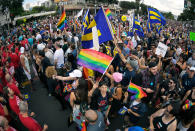 <p>Marchers gather to hear speakers at the end of the Los Angeles LGBTQ #ResistMarch, Sunday, June 11, 2017, in West Hollywood, Calif. (Photo: Mark J. Terrill/AP) </p>