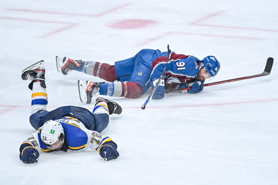 DENVER, CO - MAY 19: St. Louis Blues defenseman Justin Faulk (72) and Colorado Avalanche center Nazem Kadri (91) collide in the third period on a play that would result in a match penalty in the third period during a Stanley Cup Playoffs first round game between the St. Louis Blues and the Colorado Avalanche at Ball Arena in Denver, Colorado on May 19, 2021. (Photo by Dustin Bradford/Icon Sportswire via Getty Images)