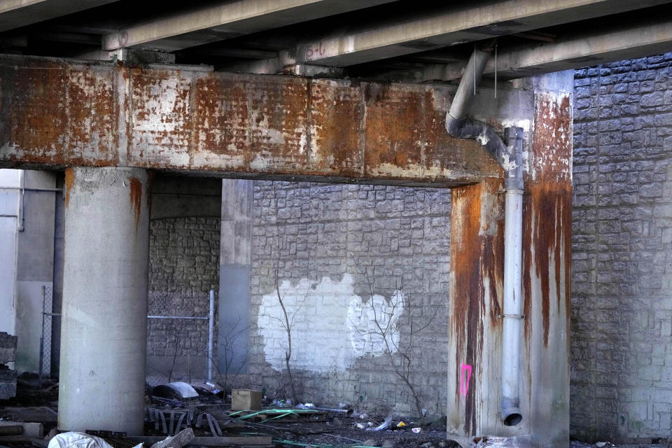 Rust stains are seen through the concrete of the understructure of the Washington Bridge, Friday, March 8, 2024, in East Providence, R.I. The closure of a section of the bridge, and onramps, due to failure of some bridge components, has caused a significant loss to local businesses. (AP Photo/Charles Krupa)