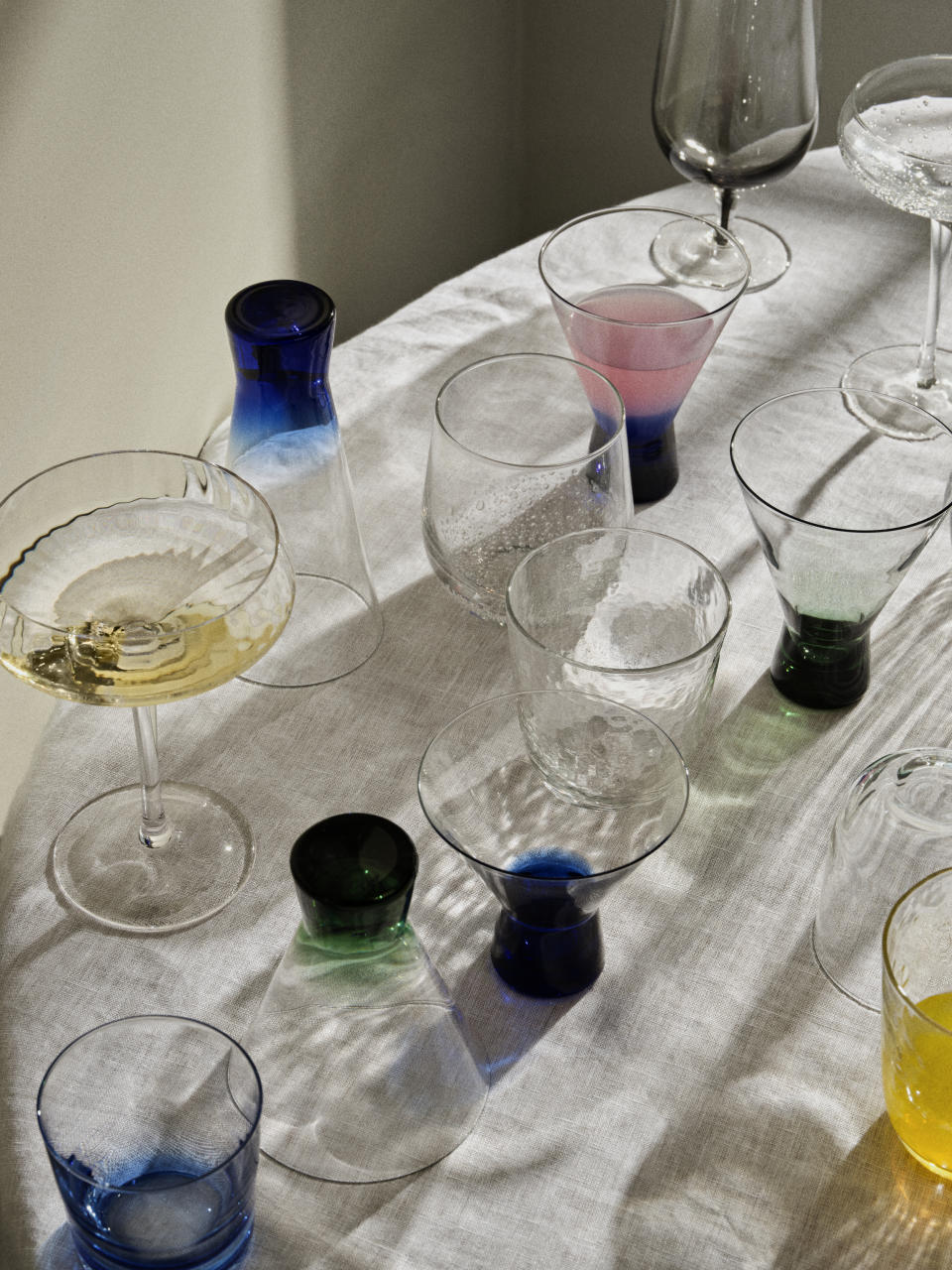 A large table with different types of wine glasses
