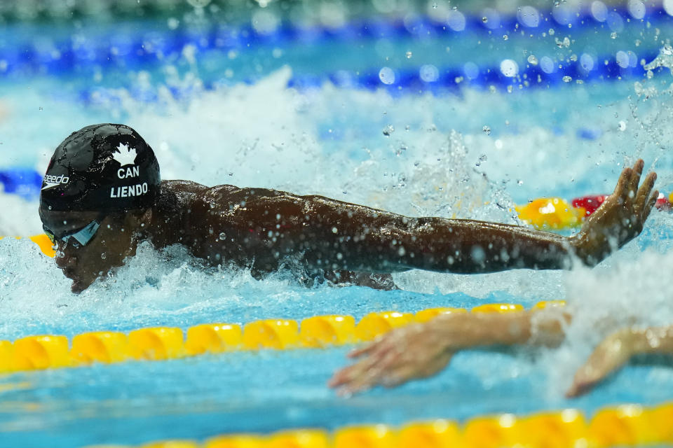 Joshua Liendo Edwards of Canada competes during the men's 100m butterlfy semifinal at the 19th FINA World Championships in Budapest, Hungary, Thursday, June 23, 2022. (AP Photo/Petr David Josek)