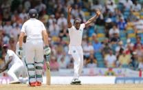 West Indies' Jerome Taylor celebrates taking the wicket of James Anderson Mandatory Credit: Action Images / John Clifton Livepic